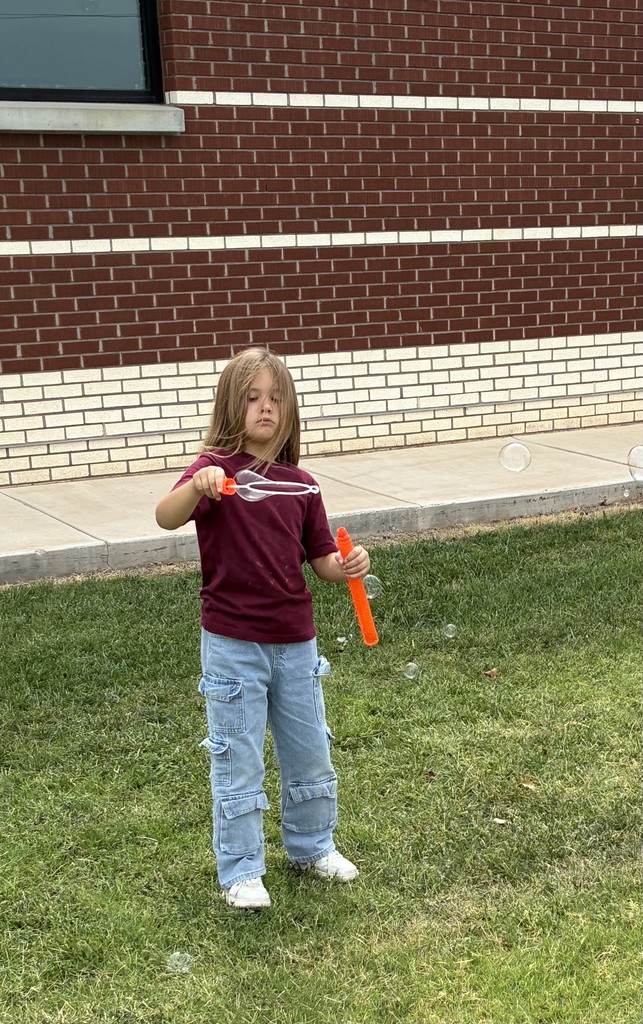 Scarlett Waldrop blowing bubbles for a self control lesson