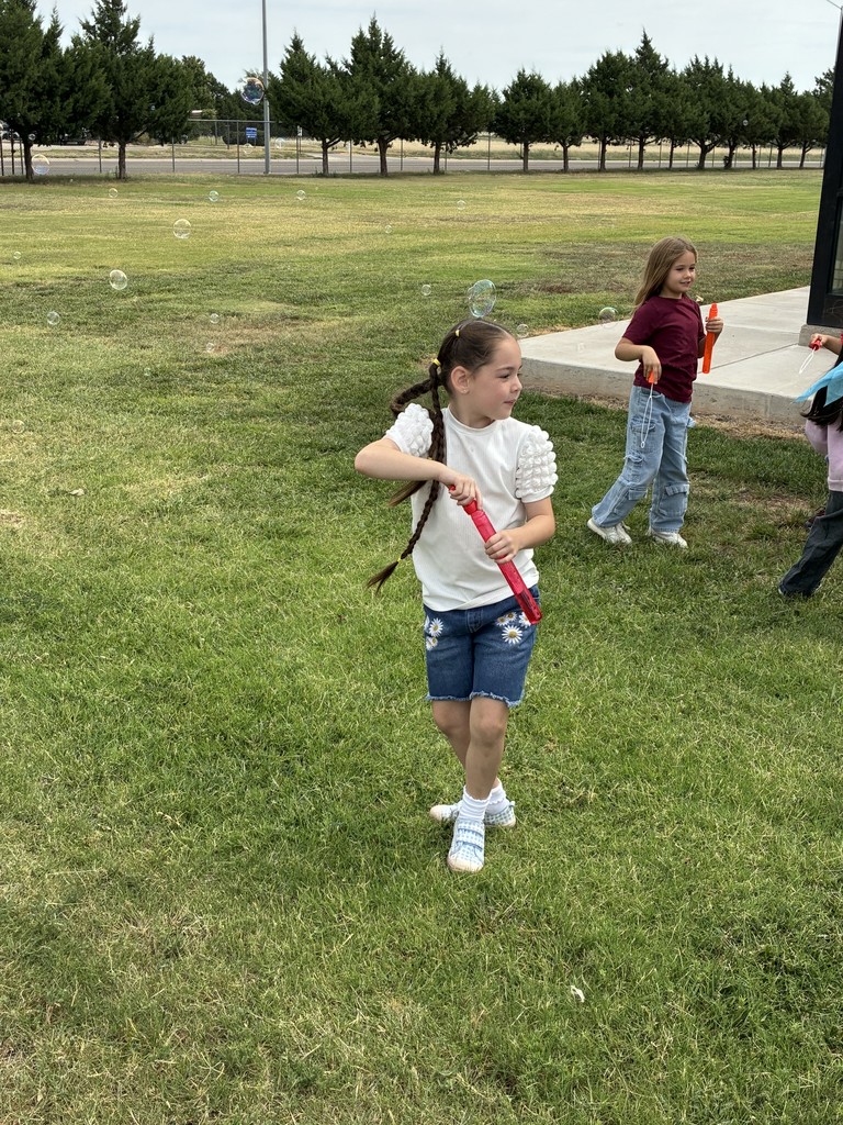 Gianna Gieger blowing bubbles for a self control lesson
