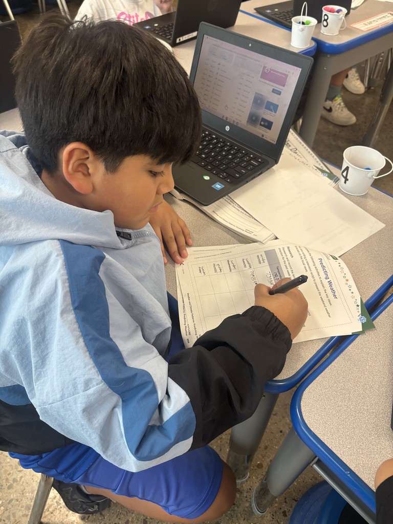 Student taking notes 