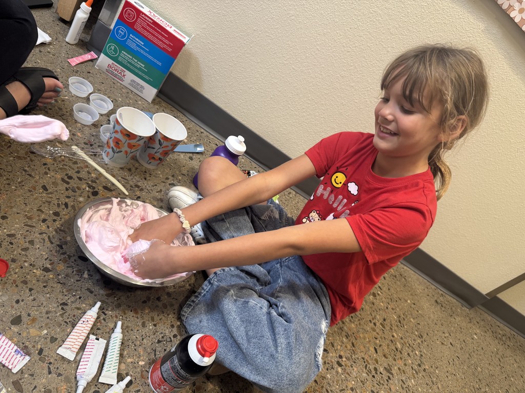 Student playing with fluffy slime!