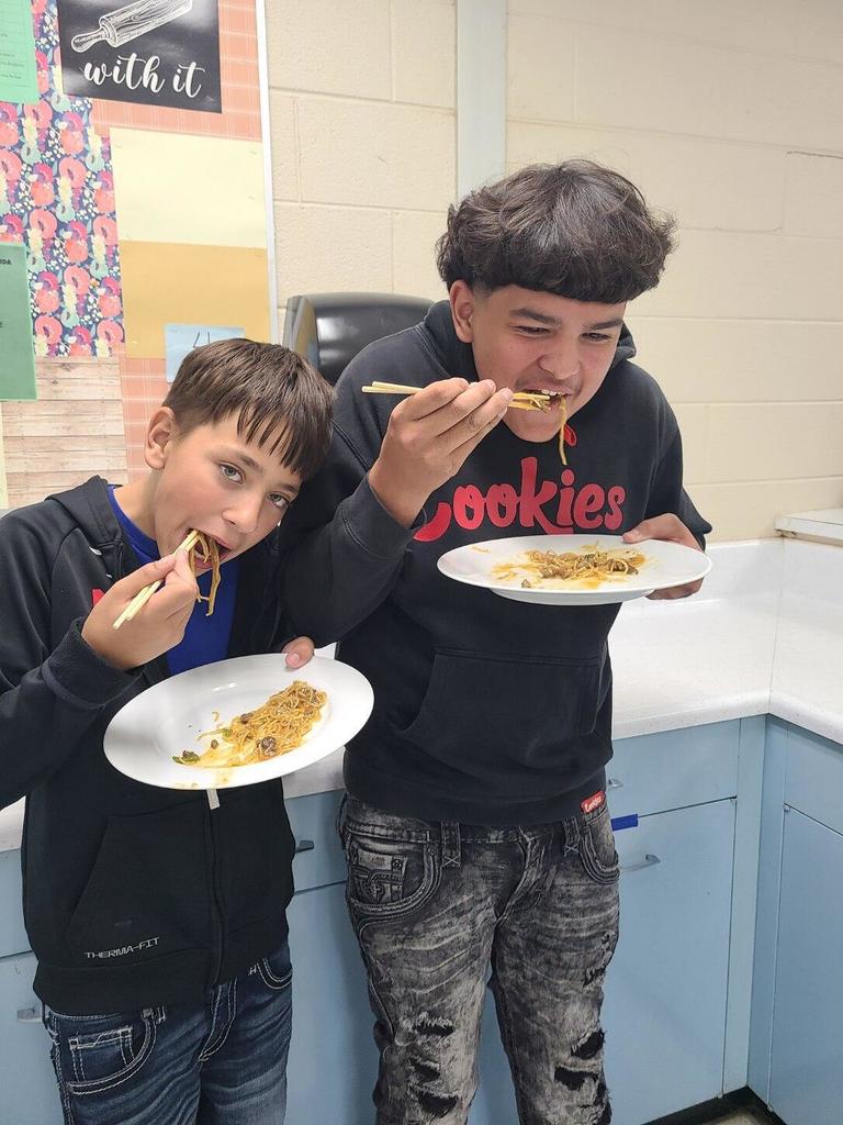 Students eating food they prepared