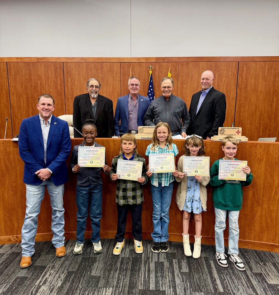 House Ambassadors with County Commission Officers after doing the pedges before their meeting. 