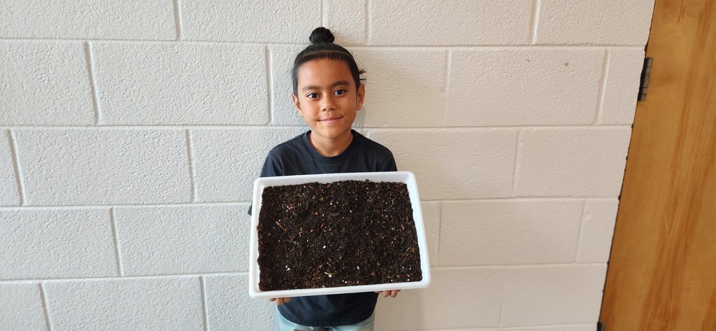 Logan with his garden