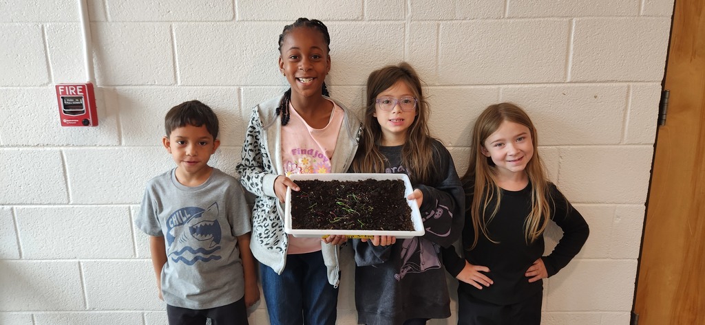 Zion, Aubrielle, Payton, and Emma with their garden