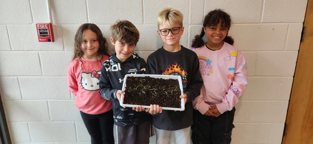 Allison, Jacob, Declan, and Melanie with their garden