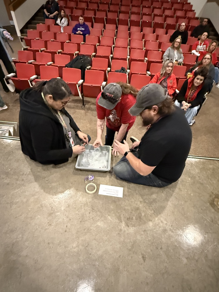 Group of teachers working on a project together