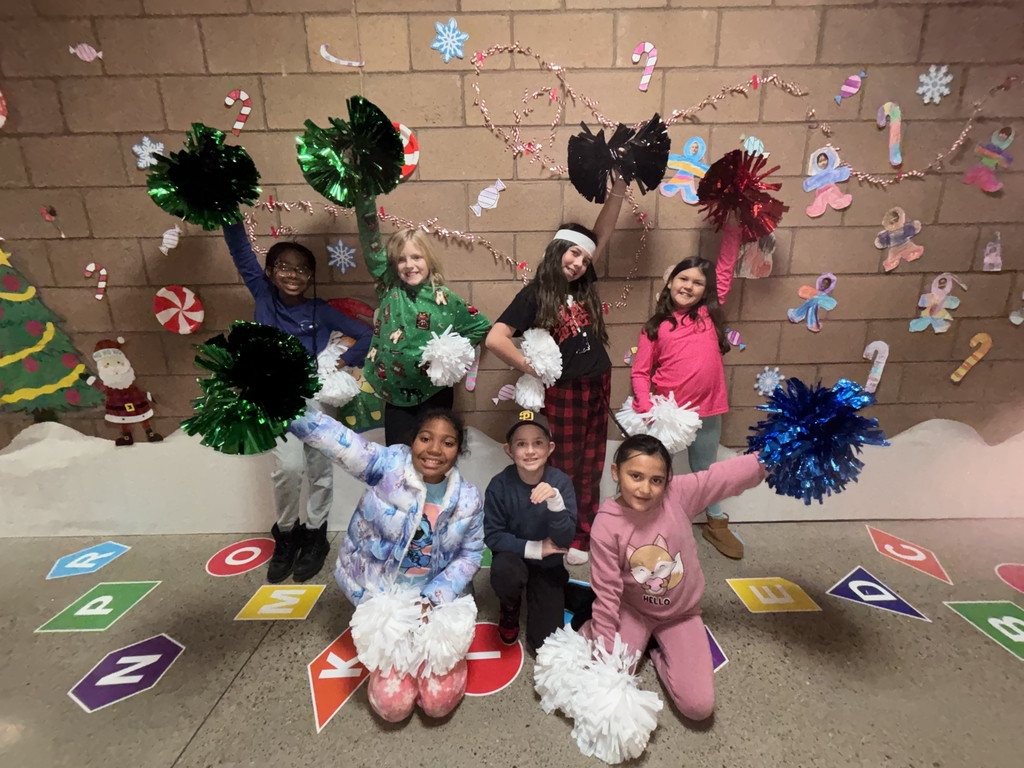 Cheer Dance Enrichment posing in a cheer/dance stance 