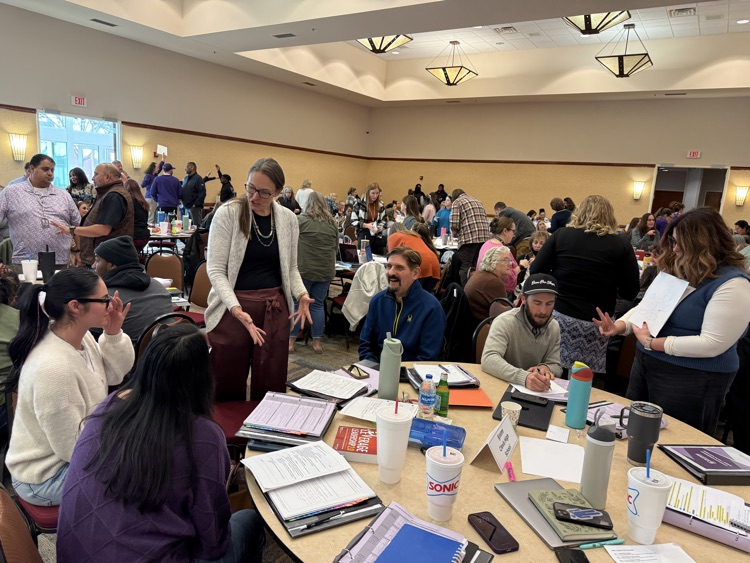 Teachers discussing the material