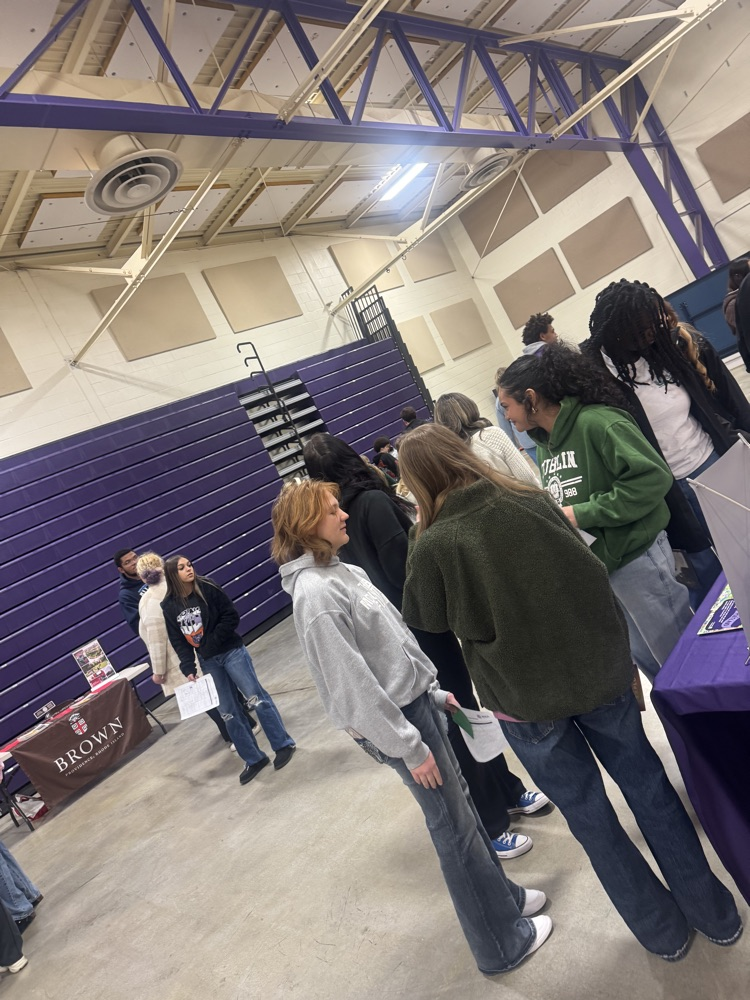 Students visiting in the gym