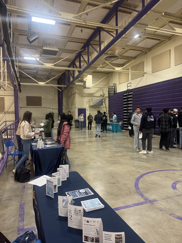 Students visiting college tables