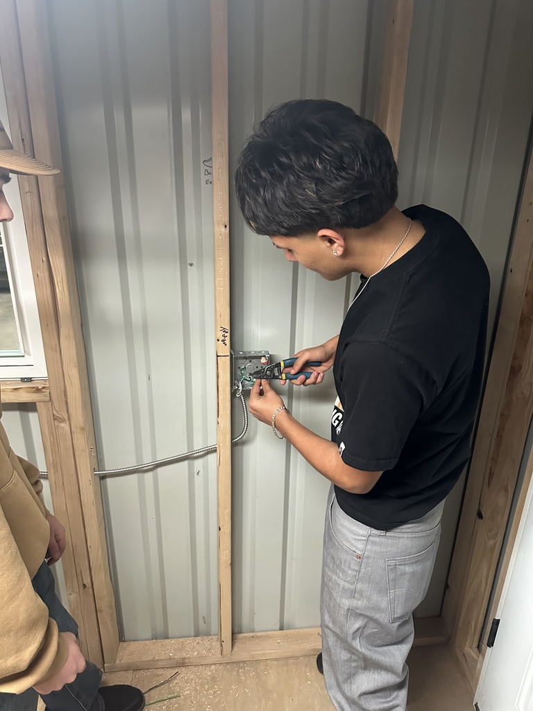 Students working on electrical wiring