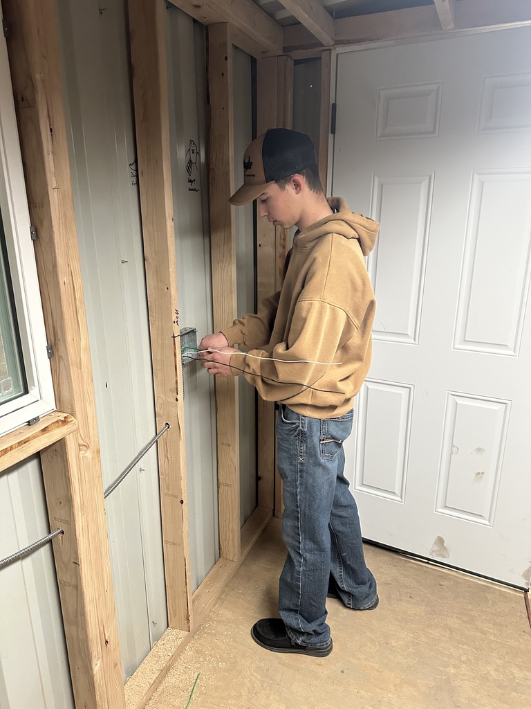Students working on electrical wiring