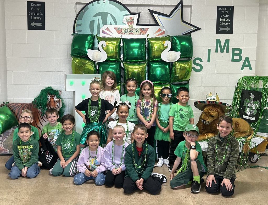 Students in green at the front of the school