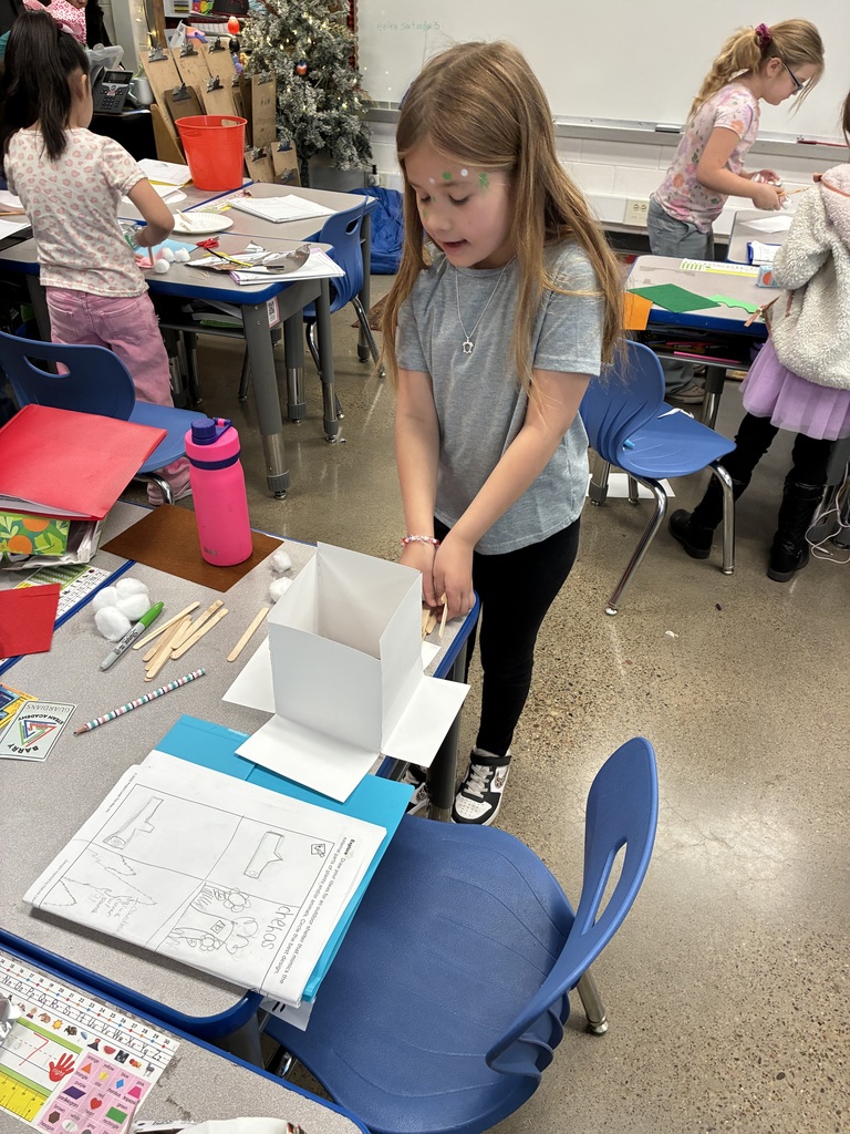 Mrs. Adams' class learning about Animal Adaptations 