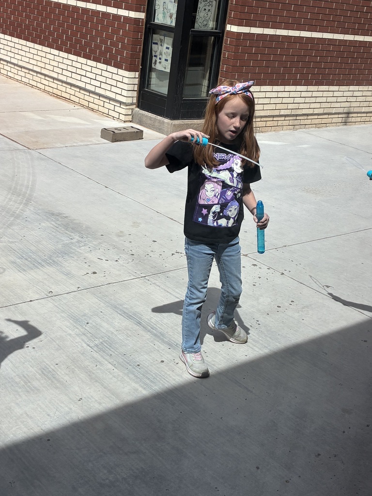 Kelsey with bubbles for "B" day - ABC Countdown