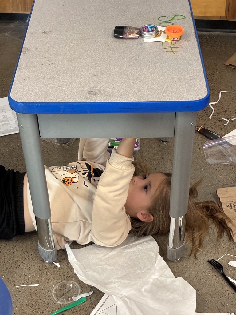 Mrs. Adams class creating art like MichaelAngelo