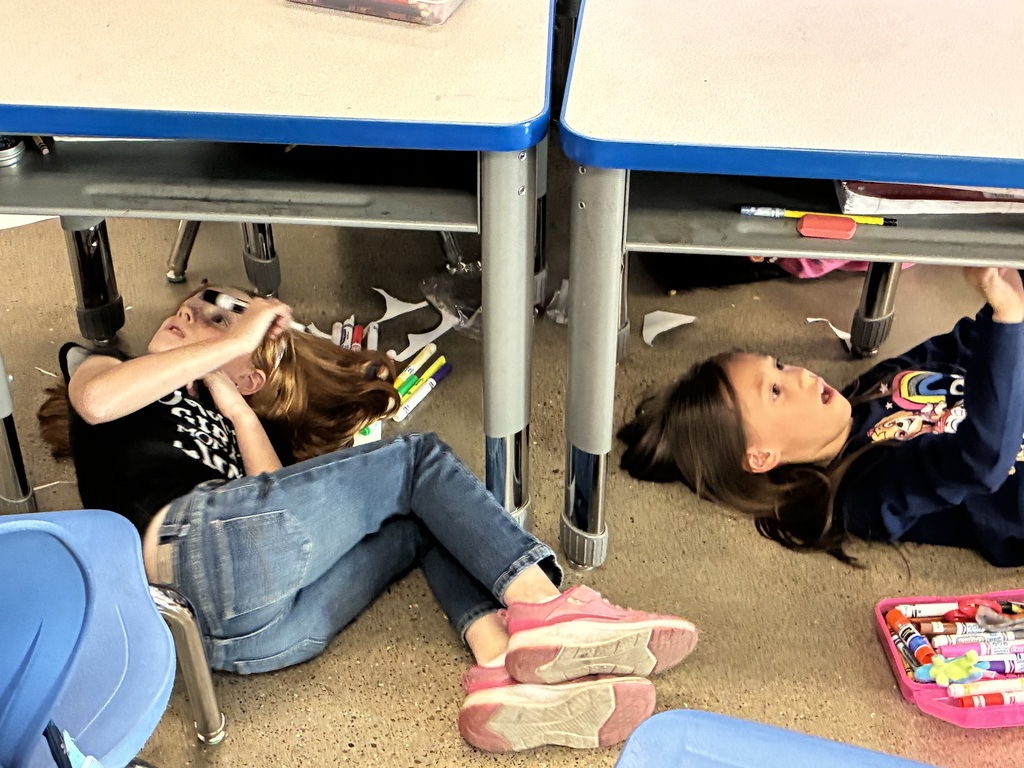 Mrs. Adams class creating art like MichelAngelo