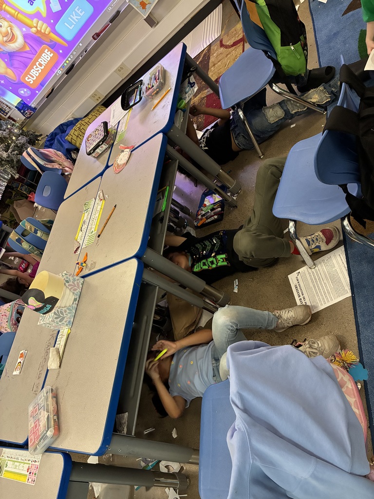 Mrs. Adams class creating art like MichaelAngelo