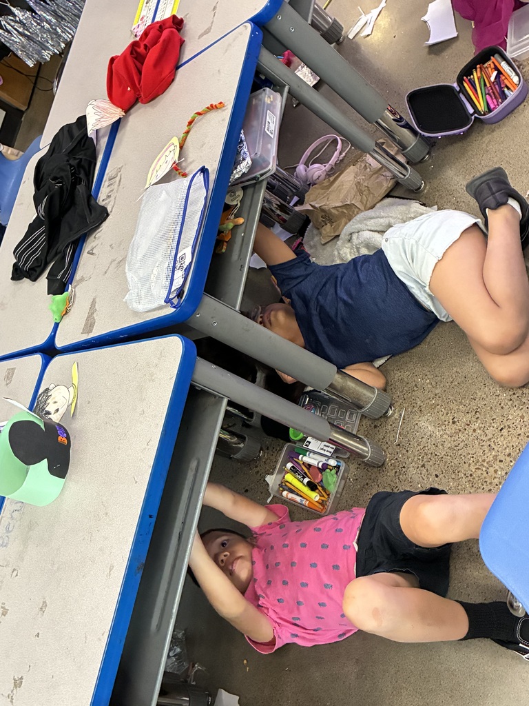 Mrs. Adams class creating art like MichaelAngelo