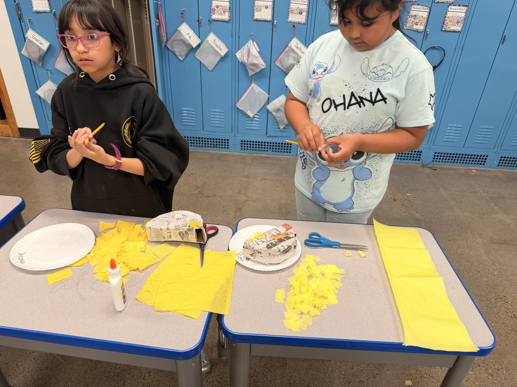 Spanish enrichment making Piñatas