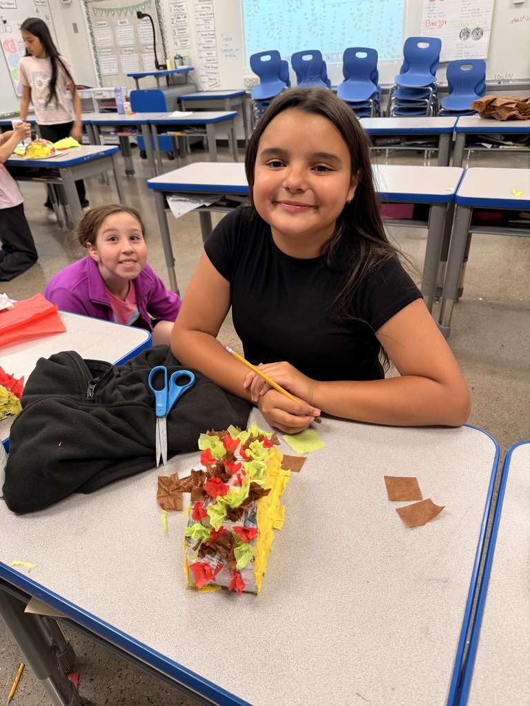 Spanish enrichment making Piñatas