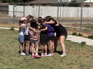 girls collaborating for field day