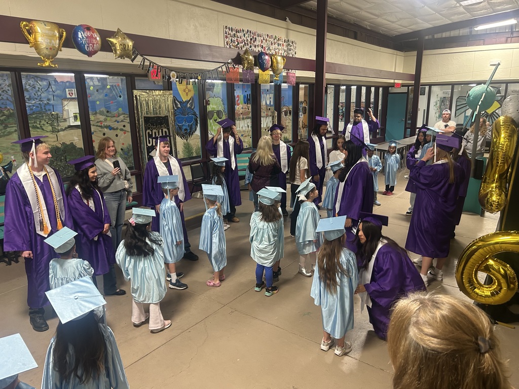 CHS graduates with kinder graduates