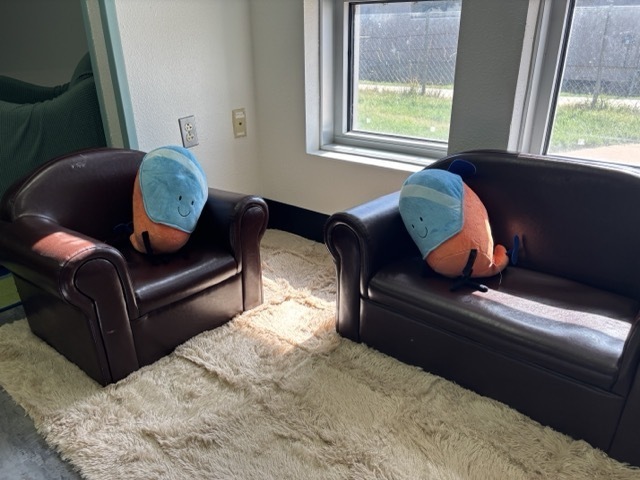 child-sized brown couches