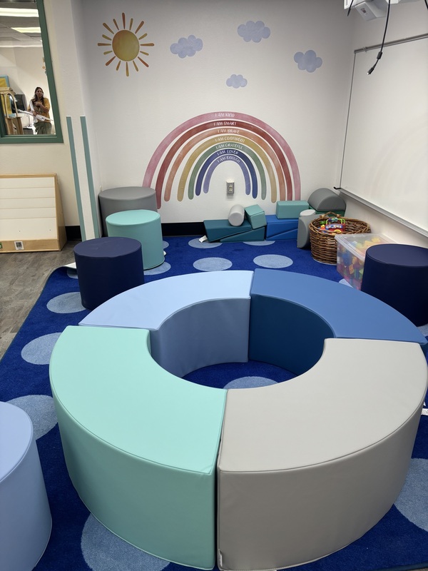 Indoor play area featuring soft play surfaces