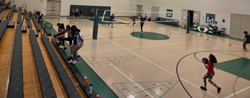 Gattis PE students completing a firefighter challenge