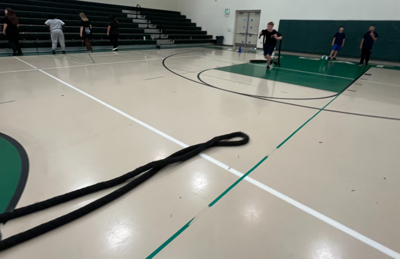 Gattis PE students completing a firefighter challenge