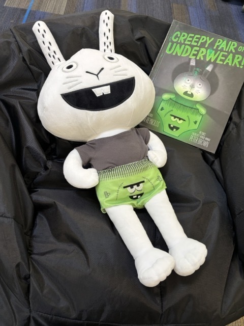 Stuffed Character bunny next to book: Creepy Pair of Underwear