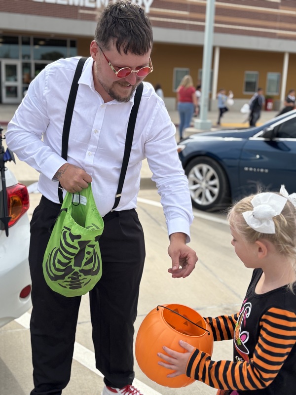 Man passing out candy