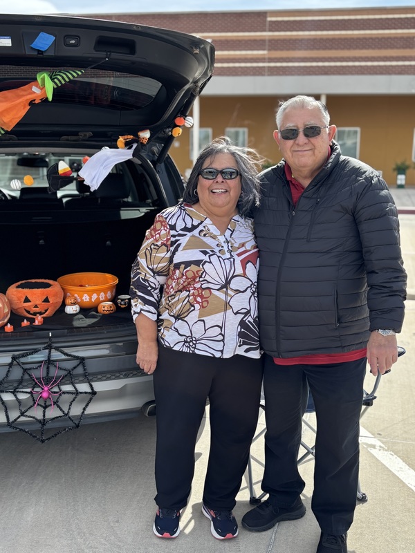 A couple posing for the photo