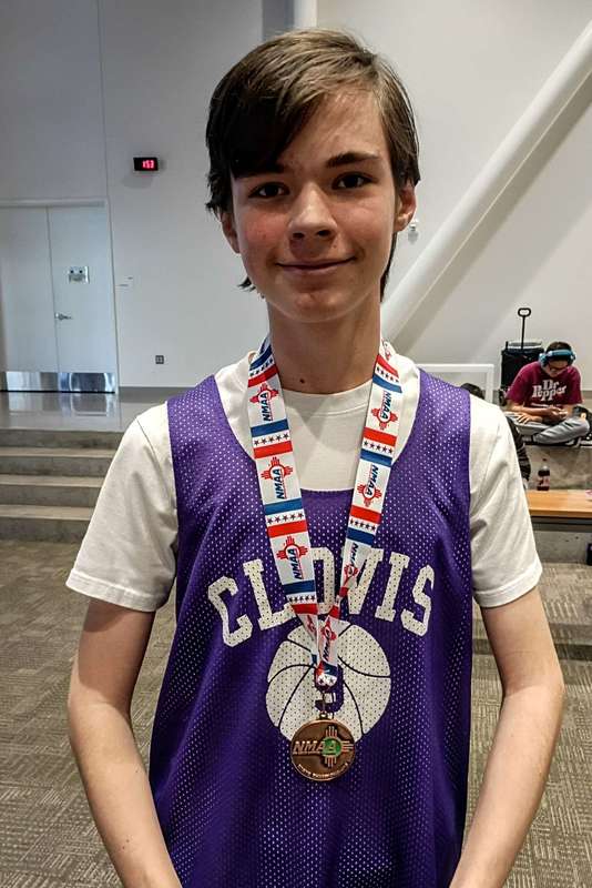 Clovis student with a bronze medal
