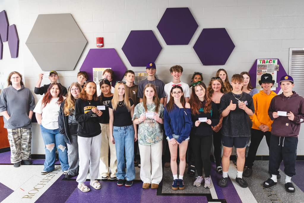students pose with mental health training certificates