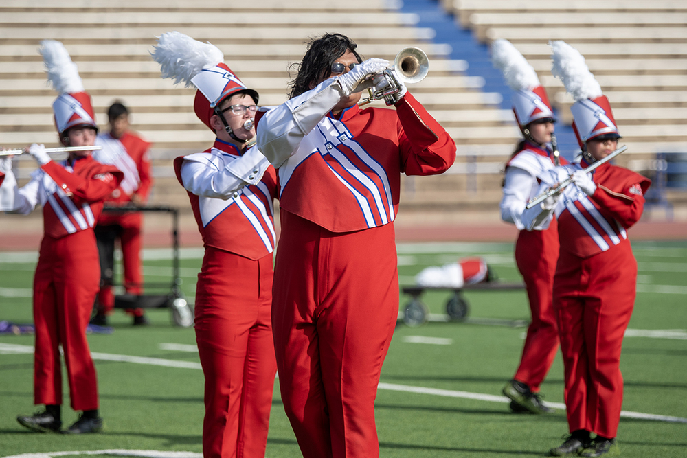 Band members playing at a marching contest