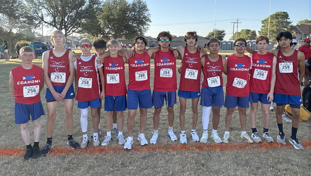 Boys cross-country team posing for a photo