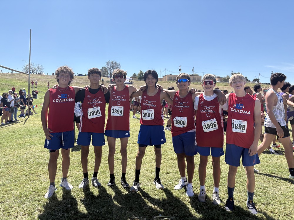 Cross Country boys team posing for a photo