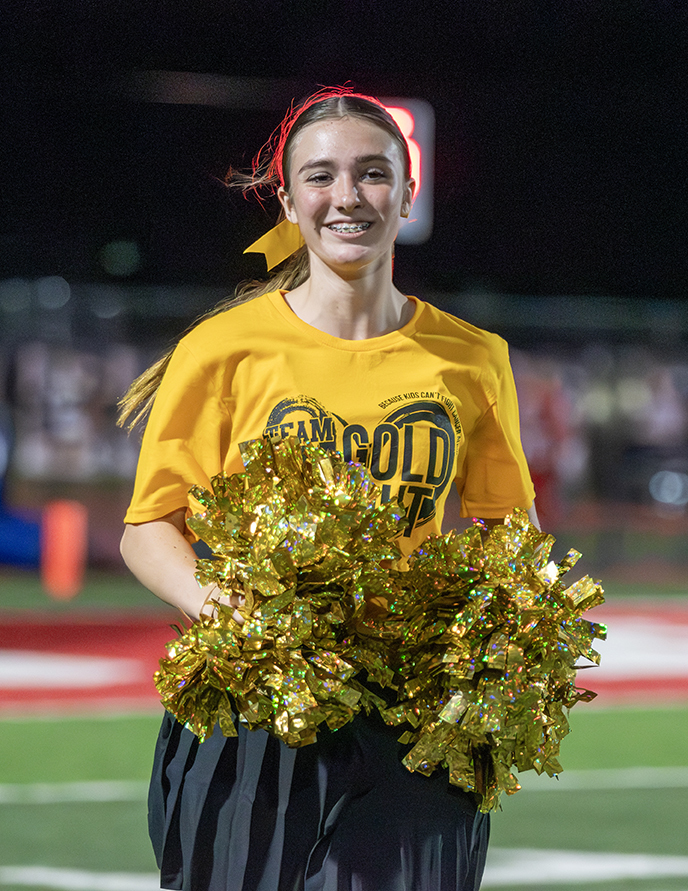 Cheerleader running