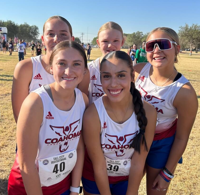 Girls cross-country team posing for a photo