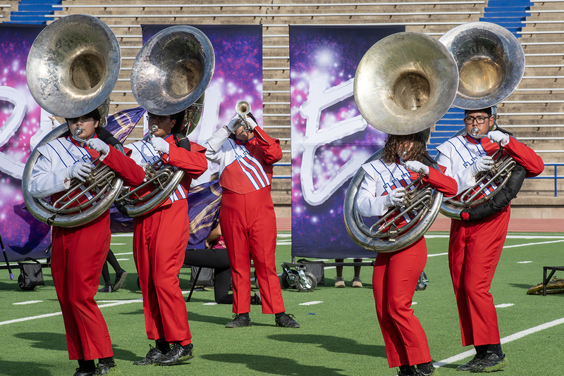 Band members playing at a marching contest