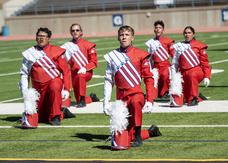 high school marching band performing