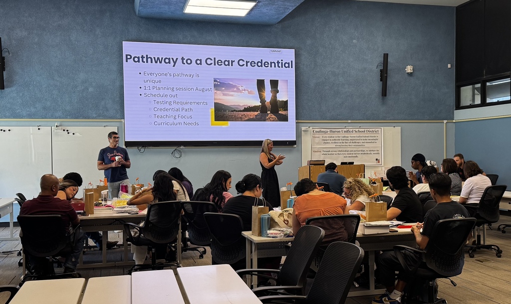 Joe Clausi and Danielle Singley present at New Teacher Orientation
