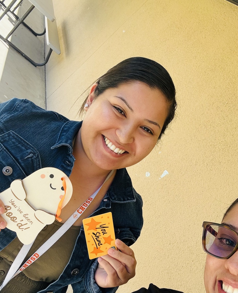 Cambridge's Campus Safety Liaison Yosari surprises a staff member with a little thank you for being safety-minded