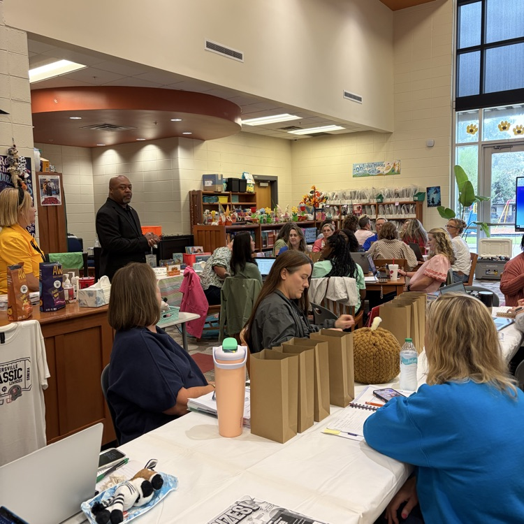 Dr. Lockhart address media specialists.