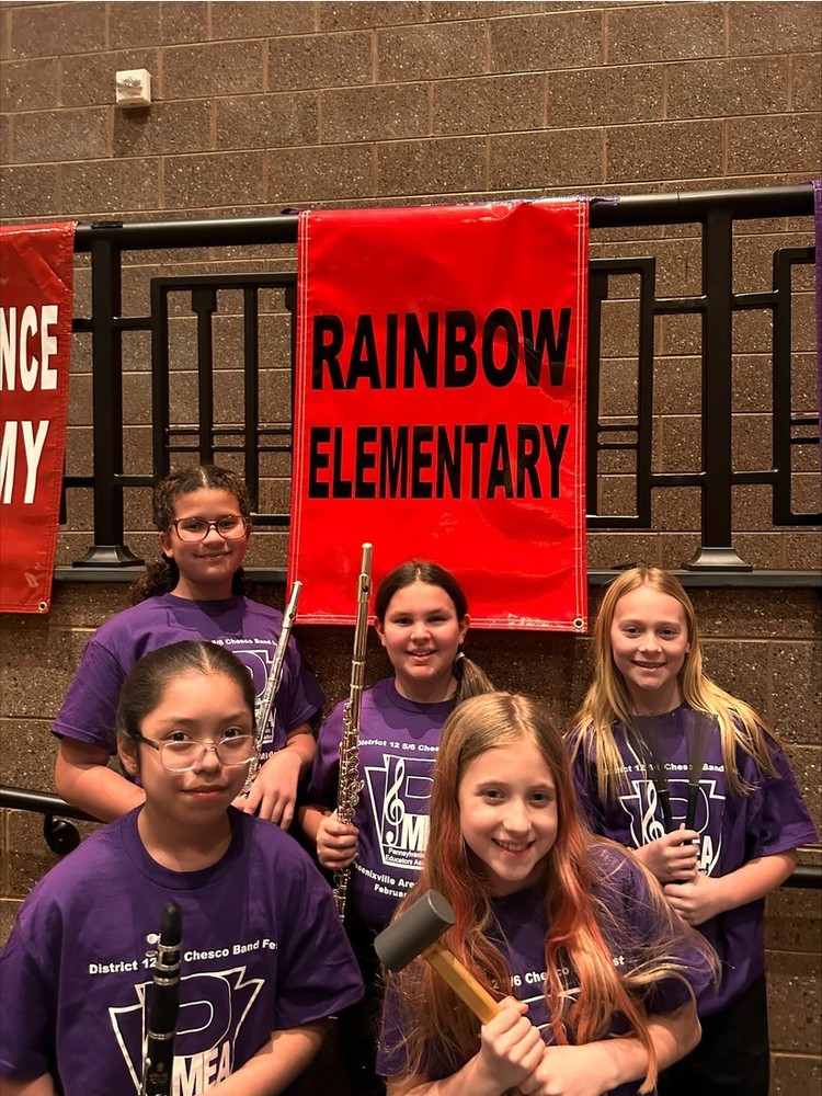 five elementary girls with instruments
