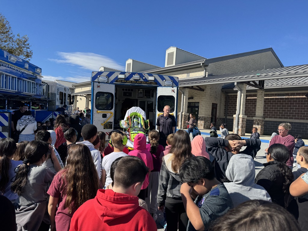 Rainbow students are visited by local firefighters to learn about fire safety.