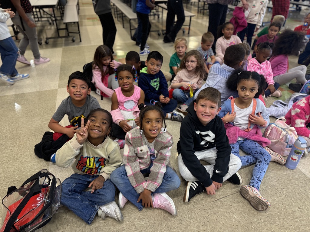 Rainbow students are visited by local firefighters to learn about fire safety.