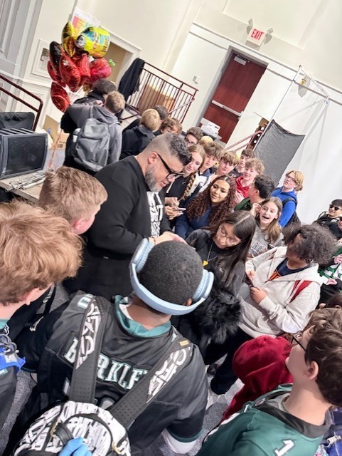 Carlos Ojeda Jr. and students at Scott Middle School